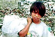 Rubbish dump child